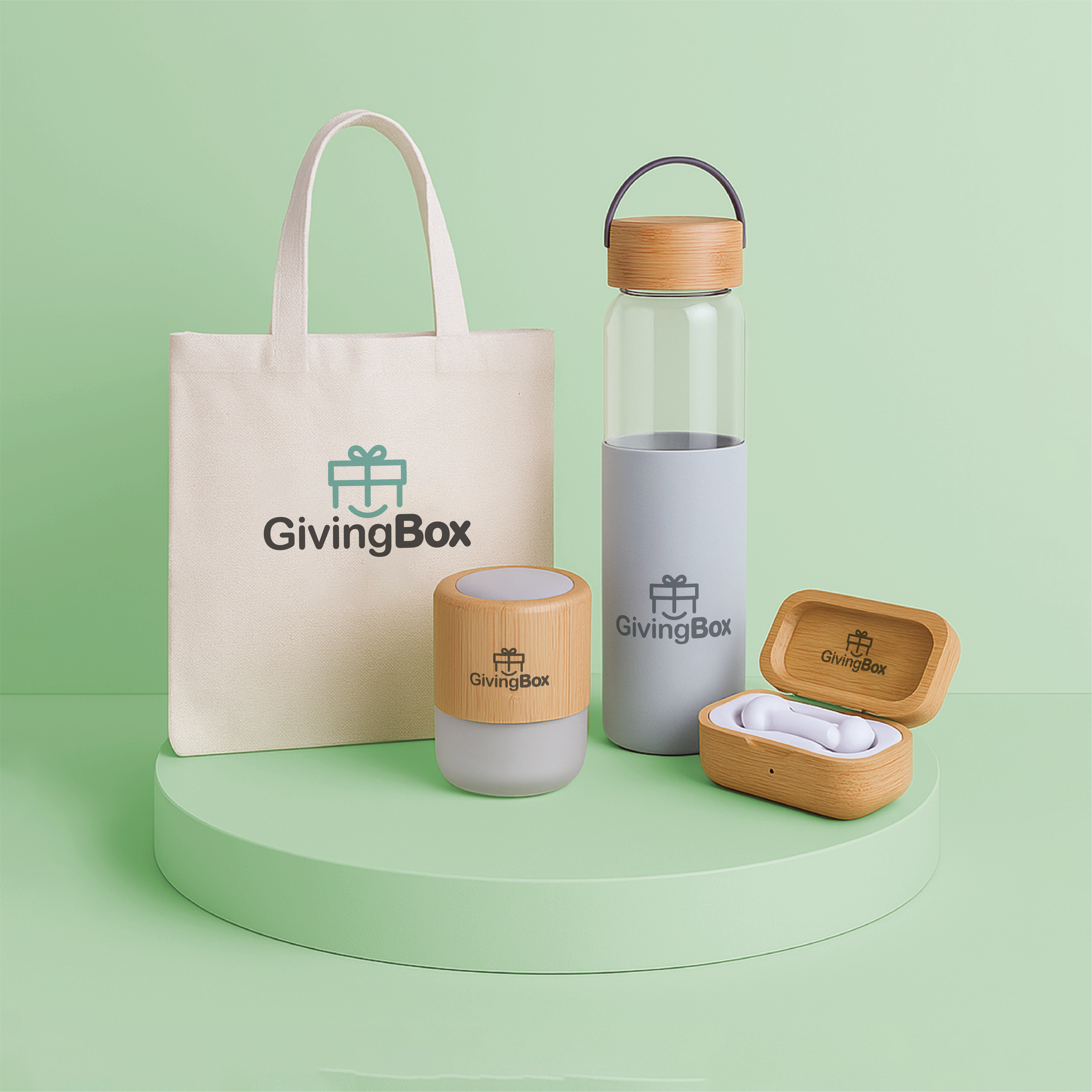 Kit eco-friendly con botella de vidrio, auriculares de bambú, parlante portátil y bolsa de lienzo.